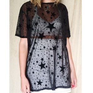 Nasty Gal sheer black star top.